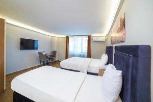 Zendy Suite Hotel