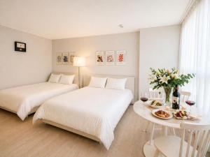 Value Stay Songdo 13층 공원뷰 루프탑 수영장 호텔침구 스마트TV 공항30분