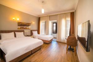 Zendy Suite Hotel