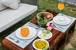 ELIVAAS Bask and Blessings Mist Suites with Private Balcony