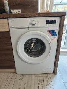 Apartment with free pool and parking space