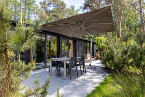 Design bungalow met wellness in parkbos