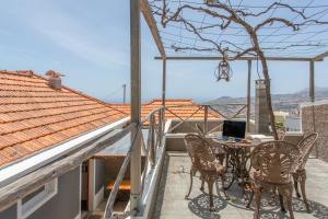 Above Funchal · A Hillside Home