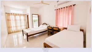 PAZHOOR RESIDENCY Homestay 11 Rooms in 3 Apartments