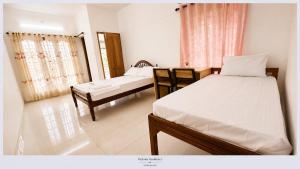 PAZHOOR RESIDENCY Homestay 11 Rooms in 3 Apartments