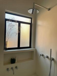Boutique Sunny 2BR Design Apartment with Cycladic Tub and Terrace