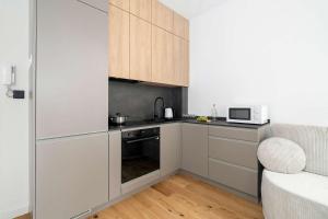 Stylish Studio with a Mezzanine Near the Market Square by Noclegi Renters