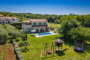 Villa Stella Polaris for 8 persons in Central Istria with private pool, sea view, large garden & kids playground