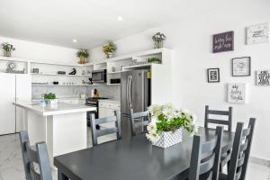 Dog-Friendly Home with Heated Pool, Hot Tub, Partial Ocean Views & Balcony