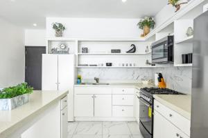 Dog-Friendly Home with Heated Pool, Hot Tub, Partial Ocean Views & Balcony