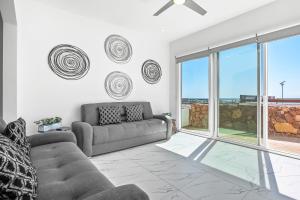 Dog-Friendly Home with Heated Pool, Hot Tub, Partial Ocean Views & Balcony