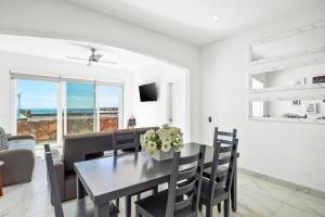 Dog-Friendly Home with Heated Pool, Hot Tub, Partial Ocean Views & Balcony