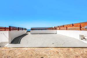 Dog-Friendly Oceanfront Villa with Pool Access, Rooftop Patio, Full Kitchen
