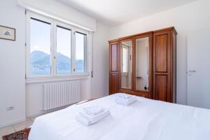 Aurora House · Balcone vista Lago Como · Parking
