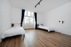 Łódź Homely Apartment by BookingHost