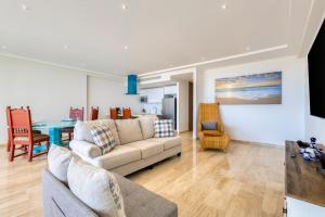 Charming Coastal Resort with Ocean Views, Pool, Gym and Shared Amenities