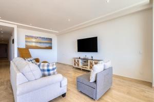 Charming Coastal Resort with Ocean Views, Pool, Gym and Shared Amenities