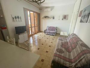 Appartamento con giardino sul mare