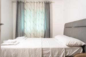 Quiet City Stay with Private Garage and 5 Min to Center