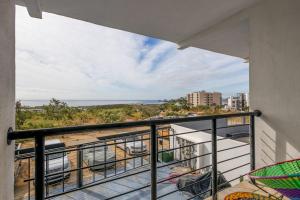 Ocean View Condo with Scenic Balcony, well-equipped Kitchen, Internet & WD