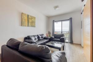 Ocean View Condo with Scenic Balcony, well-equipped Kitchen, Internet & WD