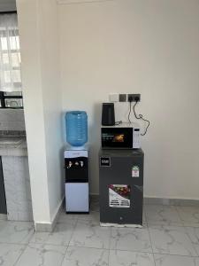 Zully Homestay Studio Apartment in Utawala Near JKIA Airport & SGR Terminus - Free Parking & Fast Wi-Fi