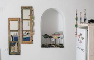 Casa Itaca luxury apartments with private jacuzzi and sea view in Foinikia - Oia