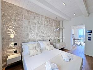 302 - MARENOSTRUM COSTARELLA LUXURY SUITES - JUNIOR SUITE CAMERA con angolo cottura