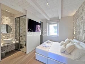 302 - MARENOSTRUM COSTARELLA LUXURY SUITES - JUNIOR SUITE CAMERA con angolo cottura