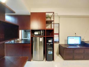 Brand New and Homey Studio at Mataram City Apartment By Travelio