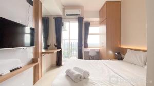 Comfy Studio at Serpong Garden Apartment By Travelio