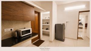 PAZHOOR RESIDENCY Homestay 11 Rooms in 3 Apartments