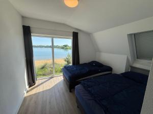 EuroParcs De Kraaijenbergse Plassen 12-Personen-Villa BeachLife Nr 318