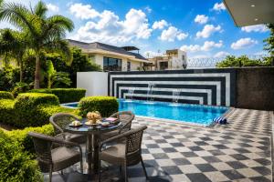 The Nivaas at Villa Bonita- Luxury Farm Stay with Pool, BBQ, Lawn in Jaipur