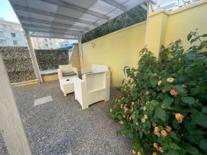 Appartamento con giardino sul mare