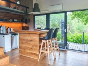 Tiny House mit Kaminofen & Terrasse direkt an Naturteichen - bis 5 Personen - Für Kurzentschlossene
