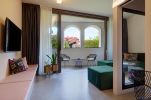 Goldengel Design-Suiten Frieda Maria im Herzen von Kaltern