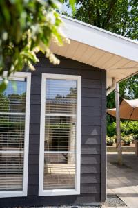 VELUWE MODERN CHALET VOORTHUIZEN - On Park With Community Swimming Pool, Restaurant and Bowling - Comfortable and Great Stay for Perfect Getaway