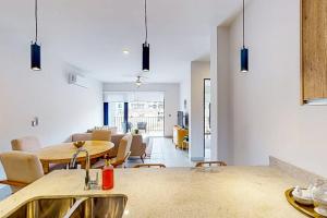 Gorgeous dog-friendly apartment with balcony, open layout, heated pool, & AC