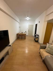 Cozy Urban Retreat in Burgos Circle, BGC