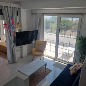 Arocaria Apartment in Faliraki with garden , mountain and sea view