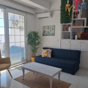 Arocaria Apartment in Faliraki with garden , mountain and sea view