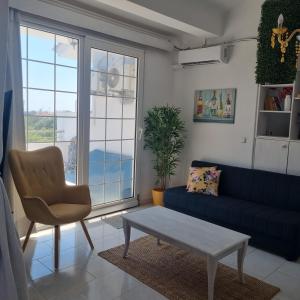 Arocaria Apartment in Faliraki with garden , mountain and sea view