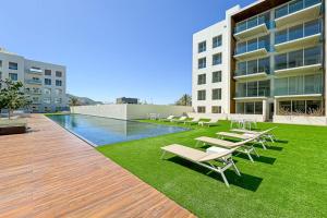 Spacious Condo with Private WasherDryer, City Views, and Shared Pool