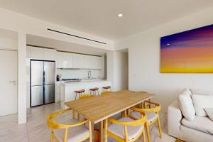 Spacious Condo with Private WasherDryer, City Views, and Shared Pool