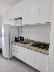 Apartamento 25 de 1 quarto aconchegante PRAIA GRANDE recém construido