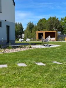Siedlisko na wydmach, sauna,domki klimatyzowane,starlink internet,parking