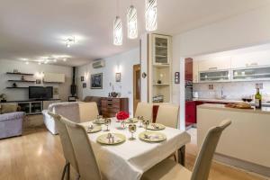 Villa Maria with a pool and tennis court