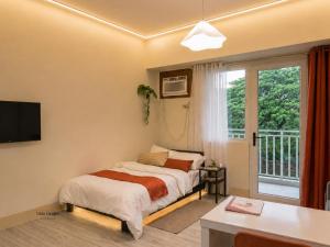 Staycation Maia Escapes Studio Apartment with Balcony and Pool view at Amaia Steps Altaraza Bulacan 5 mins from SM Tungko