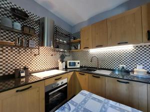 Acquazzurra, luxury duplex, pool, parking space, WiFi By Guestaly